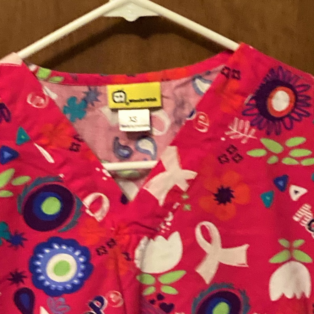 Pink scrubs with fun design